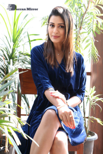 Telugu Actress Payal Rajput in a dark blue dress