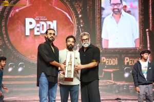 Peddi Mega Blockbuster Event attended by Ram Charan, Chiranjeevi, and others