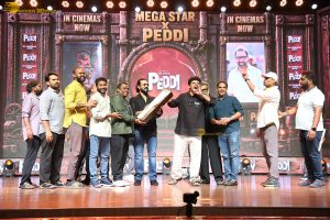 Peddi Mega Blockbuster Event attended by Ram Charan, Chiranjeevi, and others
