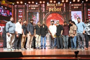 Peddi Mega Blockbuster Event attended by Ram Charan, Chiranjeevi, and others