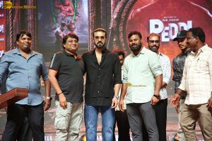 Peddi Mega Blockbuster Event attended by Ram Charan, Chiranjeevi, and others