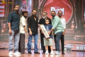 Peddi Mega Blockbuster Event attended by Ram Charan, Chiranjeevi, and others