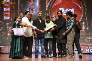 Peddi Mega Blockbuster Event attended by Ram Charan, Chiranjeevi, and others