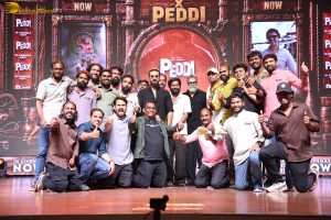 Peddi Mega Blockbuster Event attended by Ram Charan, Chiranjeevi, and others