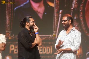Peddi Mega Blockbuster Event attended by Ram Charan, Chiranjeevi, and others