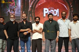 Peddi Mega Blockbuster Event attended by Ram Charan, Chiranjeevi, and others