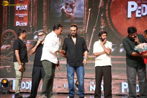 Peddi Mega Blockbuster Event attended by Ram Charan, Chiranjeevi, and others