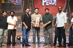 Peddi Mega Blockbuster Event attended by Ram Charan, Chiranjeevi, and others