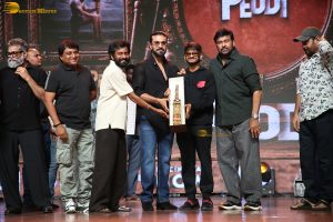 Peddi Mega Blockbuster Event attended by Ram Charan, Chiranjeevi, and others