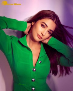 Pooja Hegde in a green dress