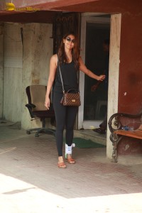 Bollywood Actress Pooja Hegde in black workout clothes