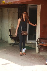 Bollywood Actress Pooja Hegde in black workout clothes