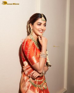 actress pooja hegde photoshoot in a red saree and jewelry