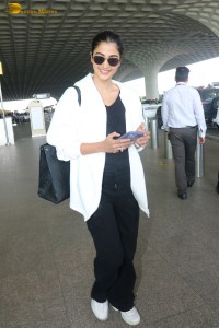 pooja hegde spotted at mumbai airport in a stylish outfit