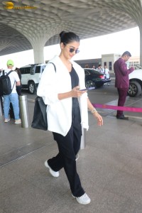 pooja hegde spotted at mumbai airport in a stylish outfit
