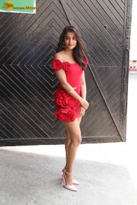 actress pooja hegde in a short red dress