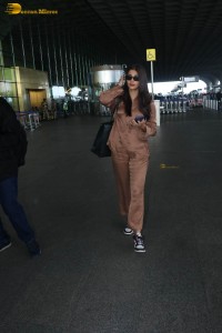 actress pooja hegde in a brown dress at airport