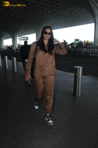 actress pooja hegde in a brown dress at airport
