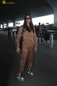 actress pooja hegde in a brown dress at airport