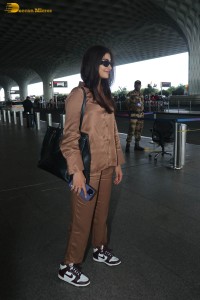 actress pooja hegde in a brown dress at airport