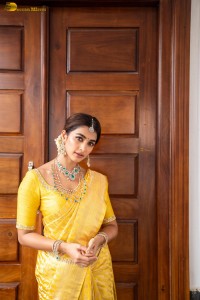 actress Pooja Hegde stunning looks in a yellow saree