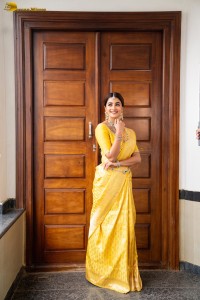 actress Pooja Hegde stunning looks in a yellow saree
