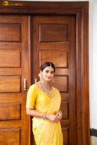 actress Pooja Hegde stunning looks in a yellow saree