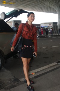 actress pooja hegde beautiful in a mini skirt at mumbai airport