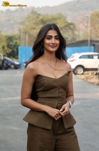 Pooja Hegde in a sleeveless and shoulderless dress