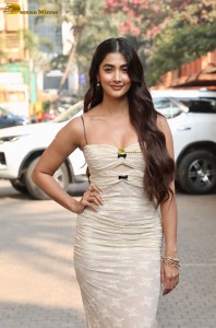 actress Pooja Hegde pretty in a noodle strap white dress