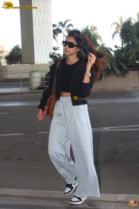 actress pooja hegde stylish in sunglasses at mumbai airport