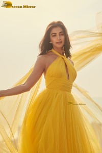 actress Pooja Hegde beautiful photo shoot in a yellow dress