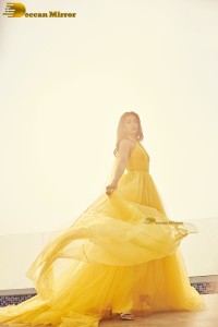 actress Pooja Hegde beautiful photo shoot in a yellow dress