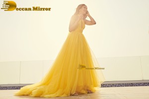 actress Pooja Hegde beautiful photo shoot in a yellow dress