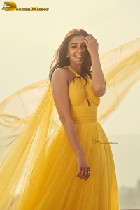 actress Pooja Hegde beautiful photo shoot in a yellow dress