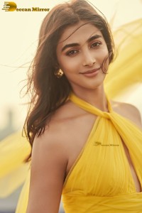 actress Pooja Hegde beautiful photo shoot in a yellow dress