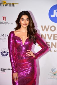 actress pooja hegde dazzling in a shiny pink dress at miss world event