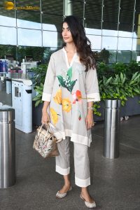 actress pooja hegde cute in a white salwar dress with floral design