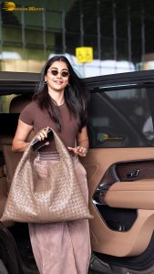 actress pooja hegde stylish and sexy in brown top and sunglasses