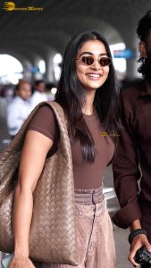 actress pooja hegde stylish and sexy in brown top and sunglasses