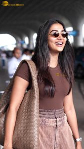 actress pooja hegde stylish and sexy in brown top and sunglasses
