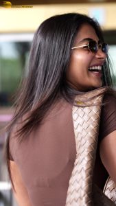 actress pooja hegde stylish and sexy in brown top and sunglasses