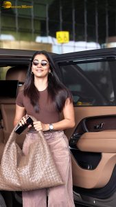 actress pooja hegde stylish and sexy in brown top and sunglasses