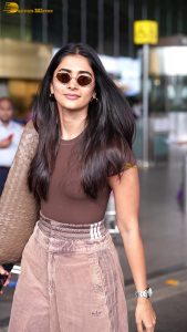 actress pooja hegde stylish and sexy in brown top and sunglasses