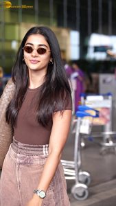 actress pooja hegde stylish and sexy in brown top and sunglasses
