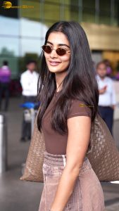 actress pooja hegde stylish and sexy in brown top and sunglasses