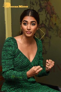 Pooja Hegde in a green dress