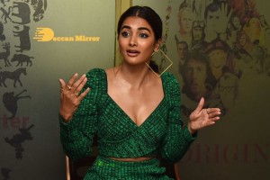 Pooja Hegde in a green dress