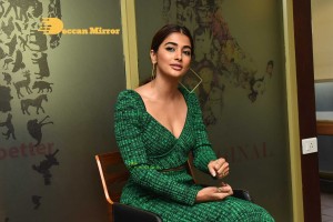 Pooja Hegde in a green dress