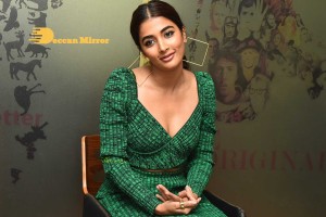 Pooja Hegde in a green dress